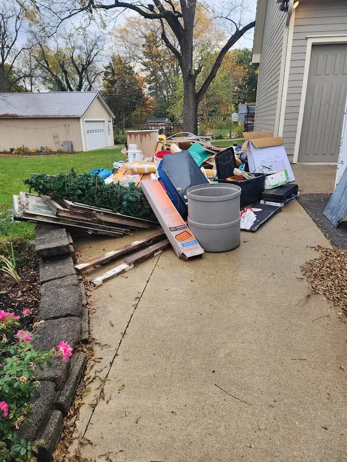 Dumpster being loaded with debris for 30 Yard Dumpster Rental in Garden Ridge